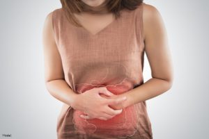 Woman experiencing gut pain